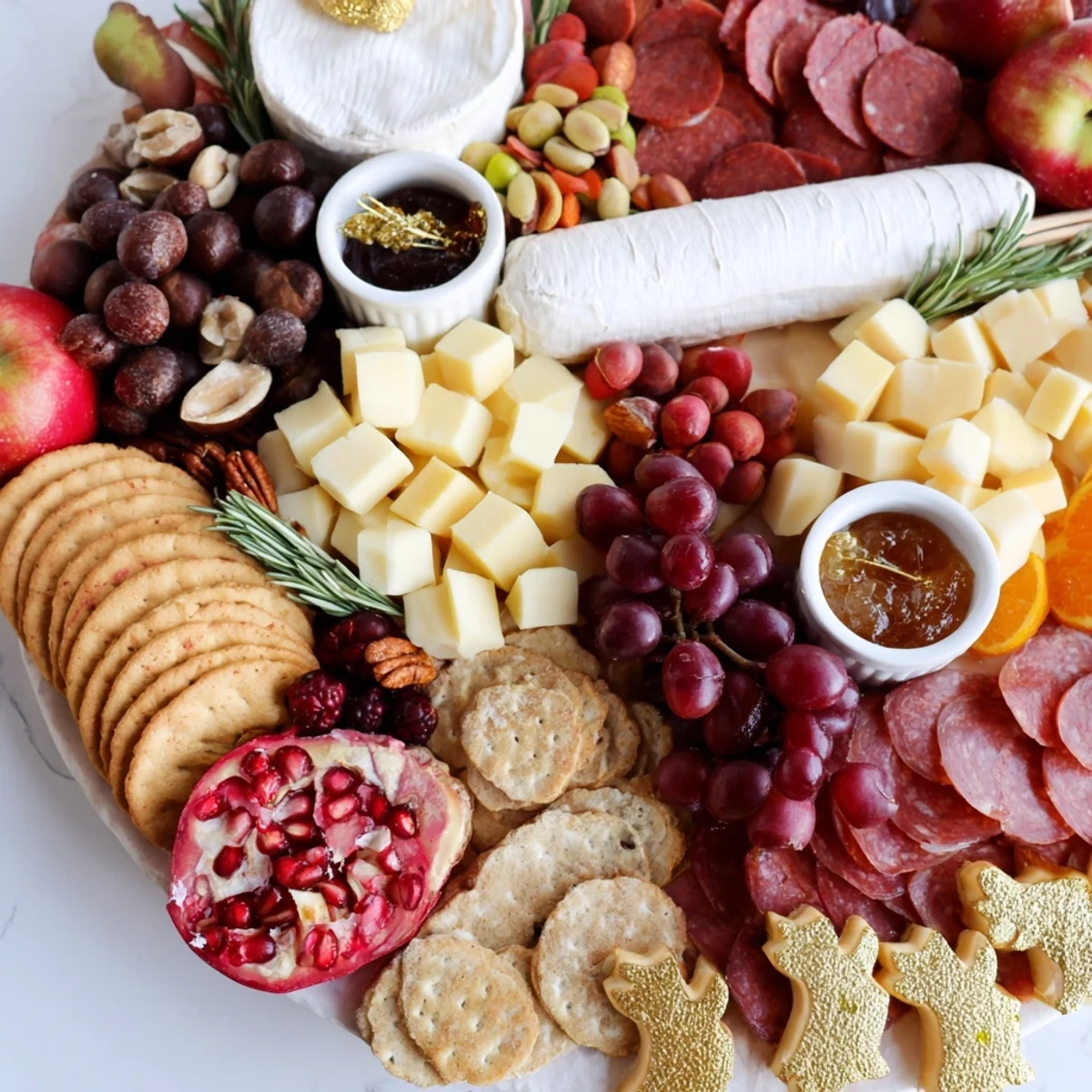 Twelve Days of Christmas snack board, overflowing with festive cheeses, fruits, and crackers for the holidays.