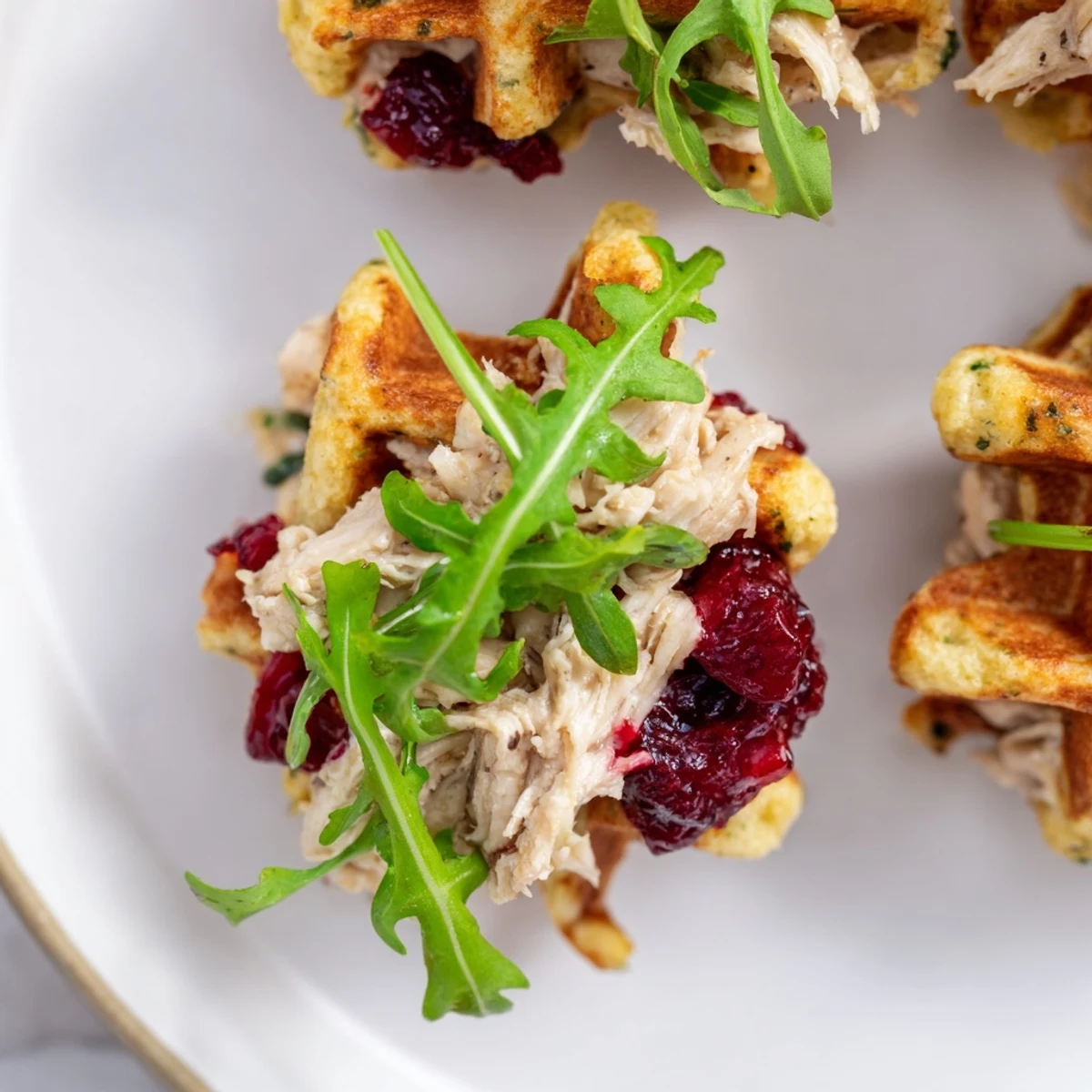 Golden, crispy stuffing waffle chicken slider with juicy chicken filling and cranberry mayo.