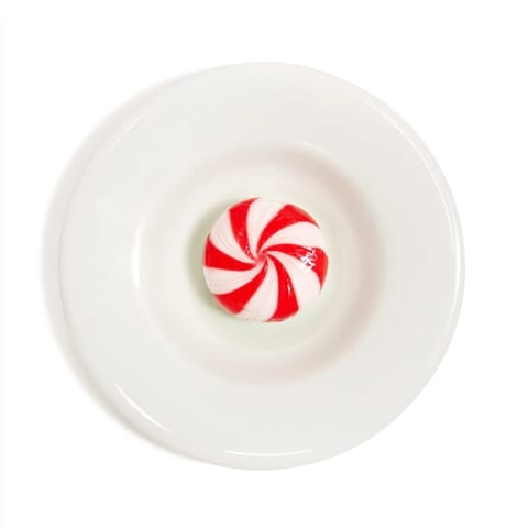 Shiny, clear No-Bake Peppermint Candy Bowl, beautifully shaped and perfect for holiday entertaining needs.