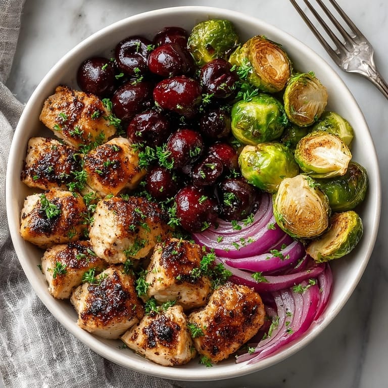 Roasted Sheet-Pan Cherry Balsamic Chicken & Brussels, a healthy, vibrant meal with flavorful balsamic notes.