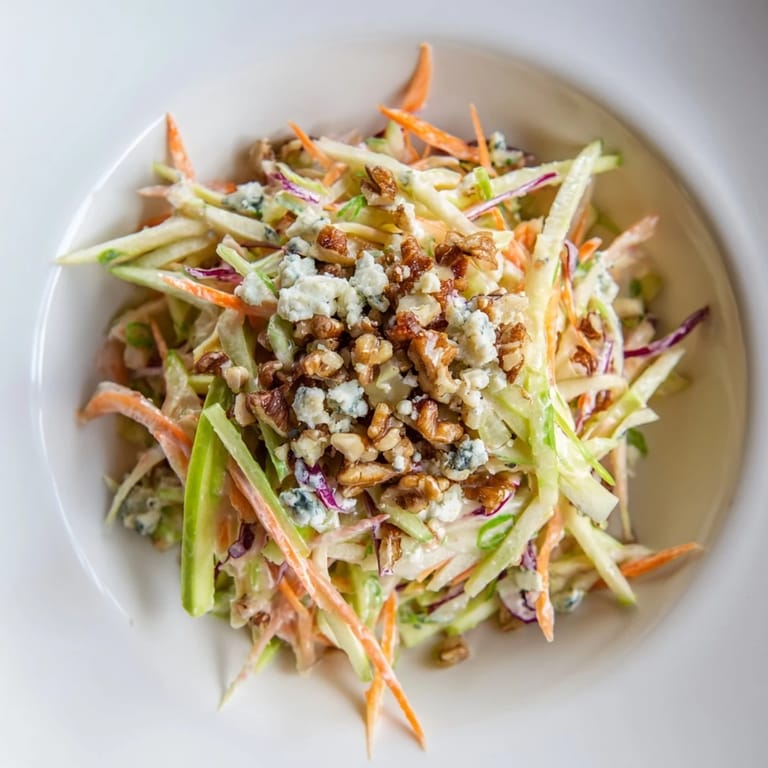 Close-up of the delicious Crunchy Apple & Walnut Slaw, highlighting the textures and vibrant colors.